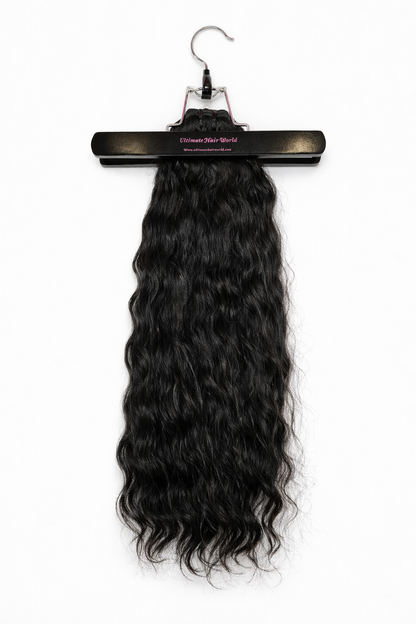Indian natural wave human hair bundles from UltimateHairWorld, showcasing raw, soft, and textured hair with a natural wave pattern.