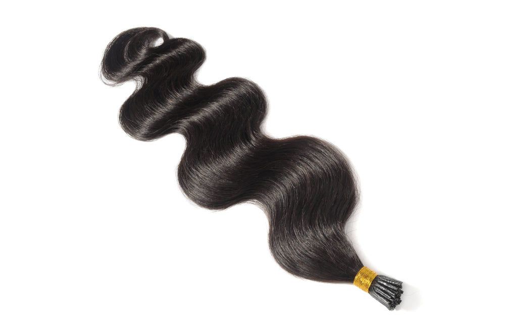 I-Tip and keratin hair extensions by UltimateHairWorld showing sleek, straight hair with seamless application for added length and volume.